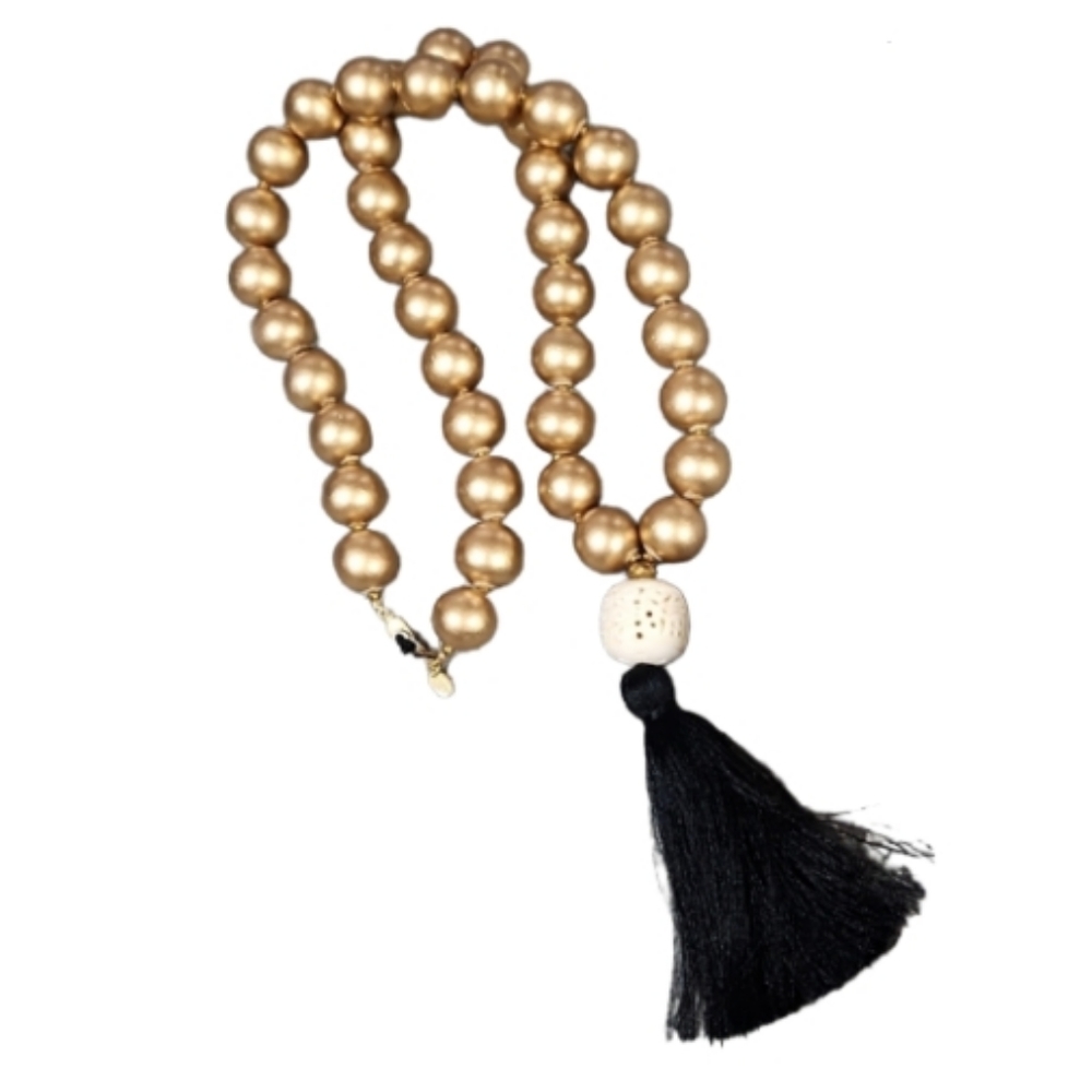 Betsy Pittard designs new bone carved gold bead necklace